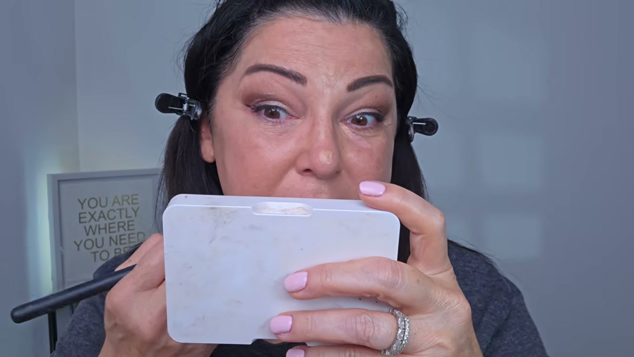 @laurafagelman reviewing e.l.f. Cosmetics Soft Glam Satin Concealer at 18:35 in a YouTube Shorts video
