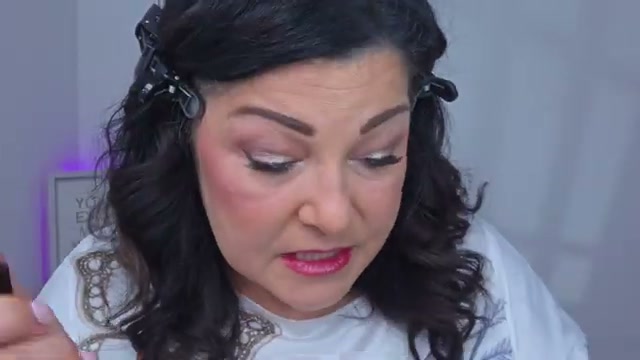 @laurafagelman reviewing Faux Color Glisten Opal Hydrating Lip Balm at 48:39 in a YouTube Shorts video