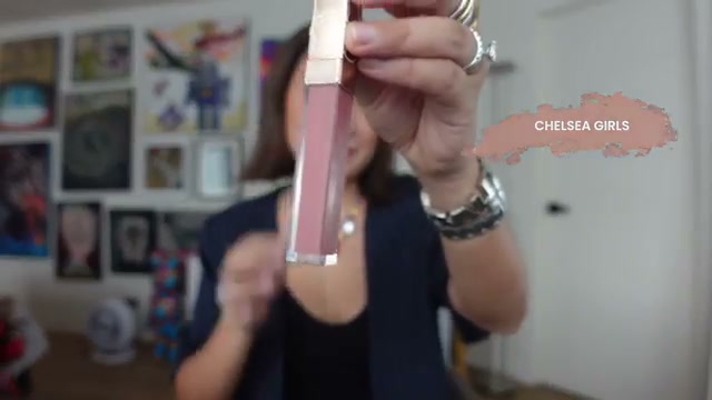 @laureenuy reviewing NARS Lip Gloss at 08:13 in a YouTube Shorts video