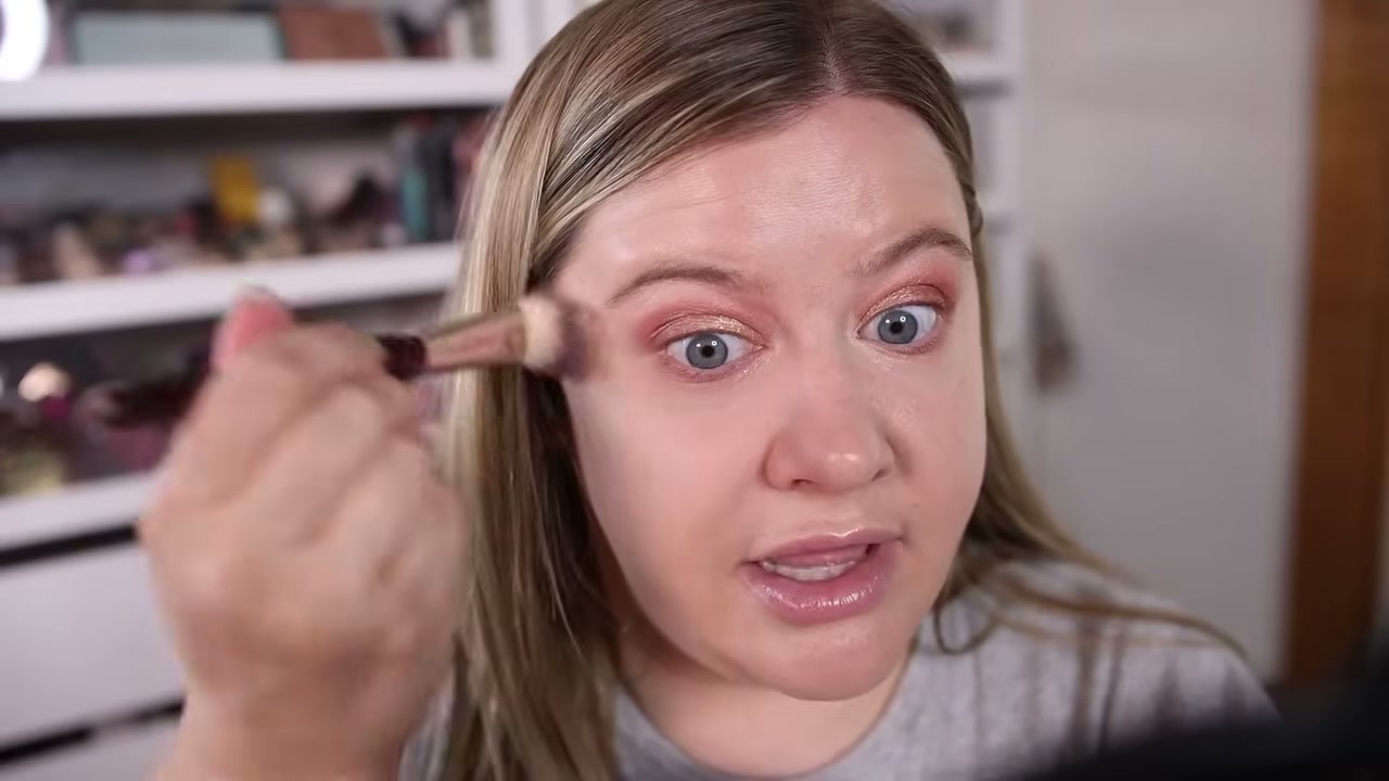 @leahjanae reviewing e.l.f. Cosmetics Set It Bright Powder at 11:26 in a YouTube Shorts video