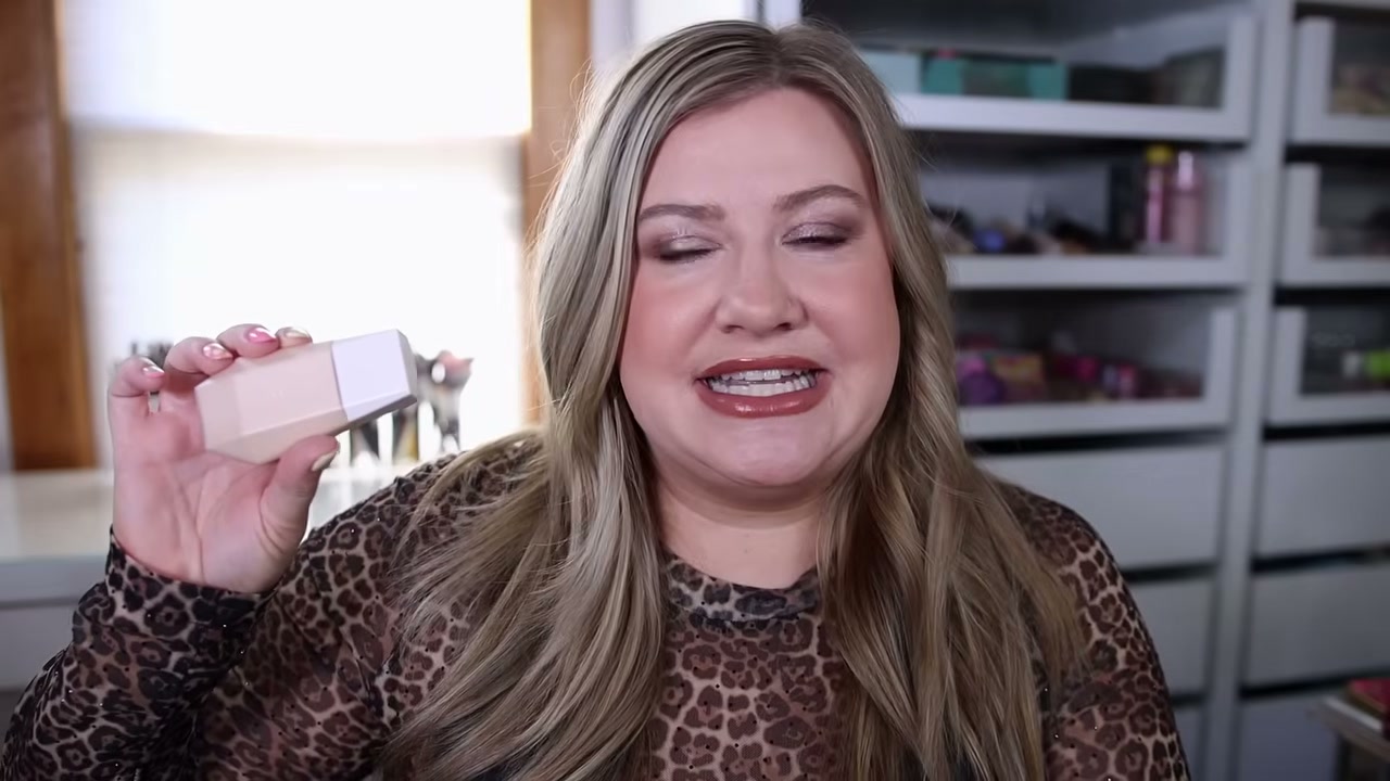 @leahjanae reviewing Fenty Beauty Eaze Drop Blurring Skin Tint at 01:47 in a YouTube Shorts video
