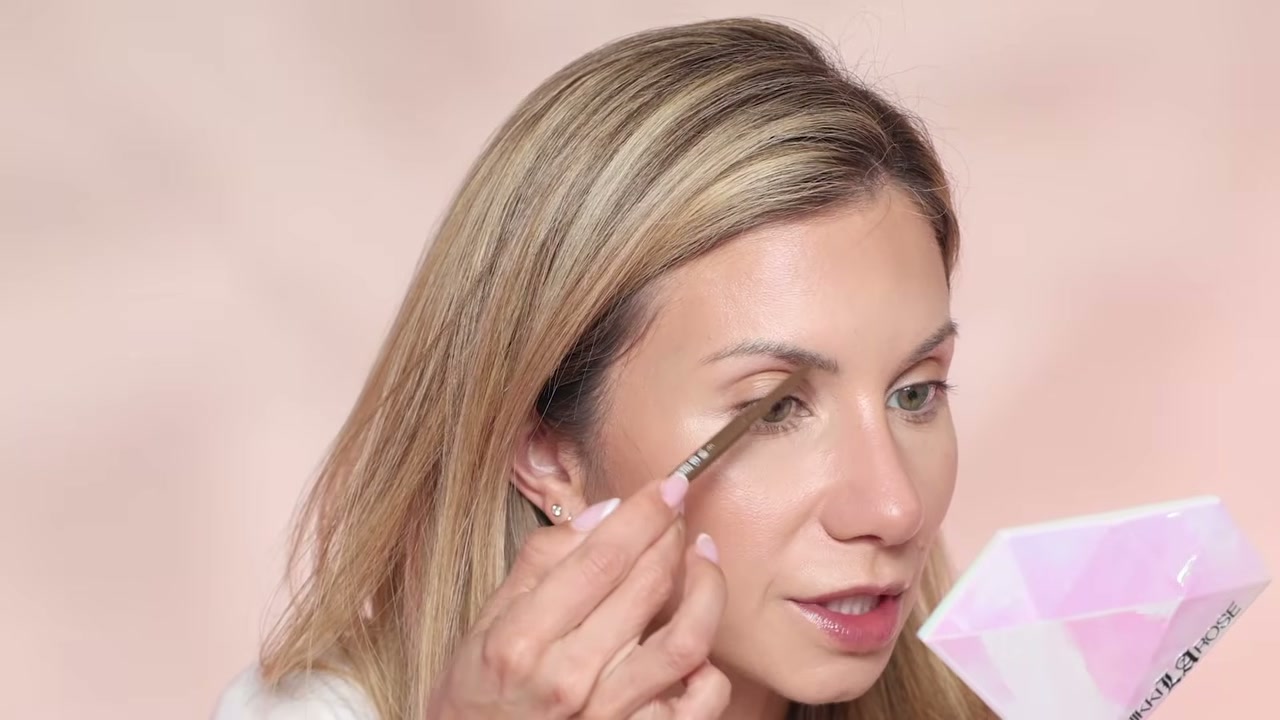 @lisajmakeup reviewing e.l.f. Cosmetics Micro-Fine Brow Pencil at 09:12 in a YouTube Shorts video