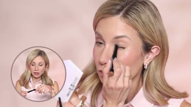 @lisajmakeup reviewing Yves Saint Laurent Lash Latex Mascara at 16:01 in a YouTube Shorts video