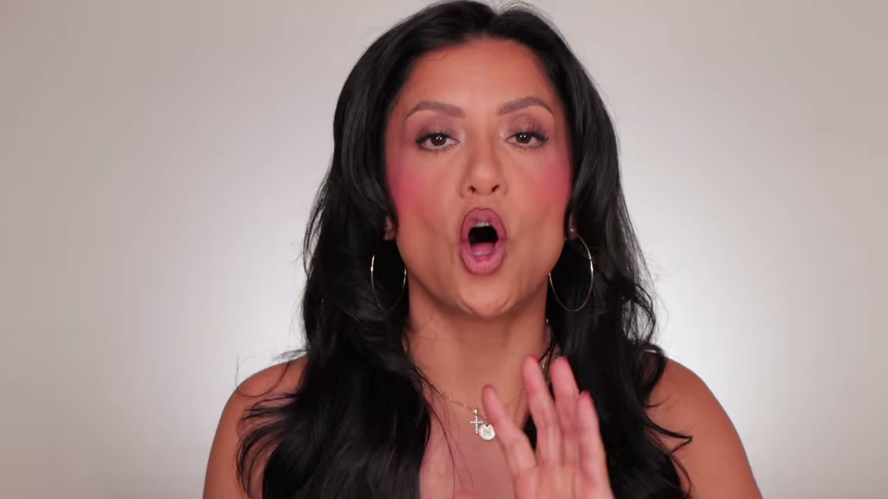 @magdalinejanet reviewing Charlotte Tilbury Pressed Powder at 15:07 in a YouTube Shorts video