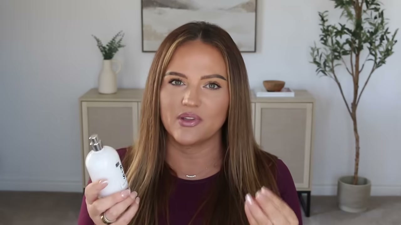 @makeupbycheryl reviewing DedCool Xtra Milk Linen Spray at 01:55 in a YouTube Shorts video