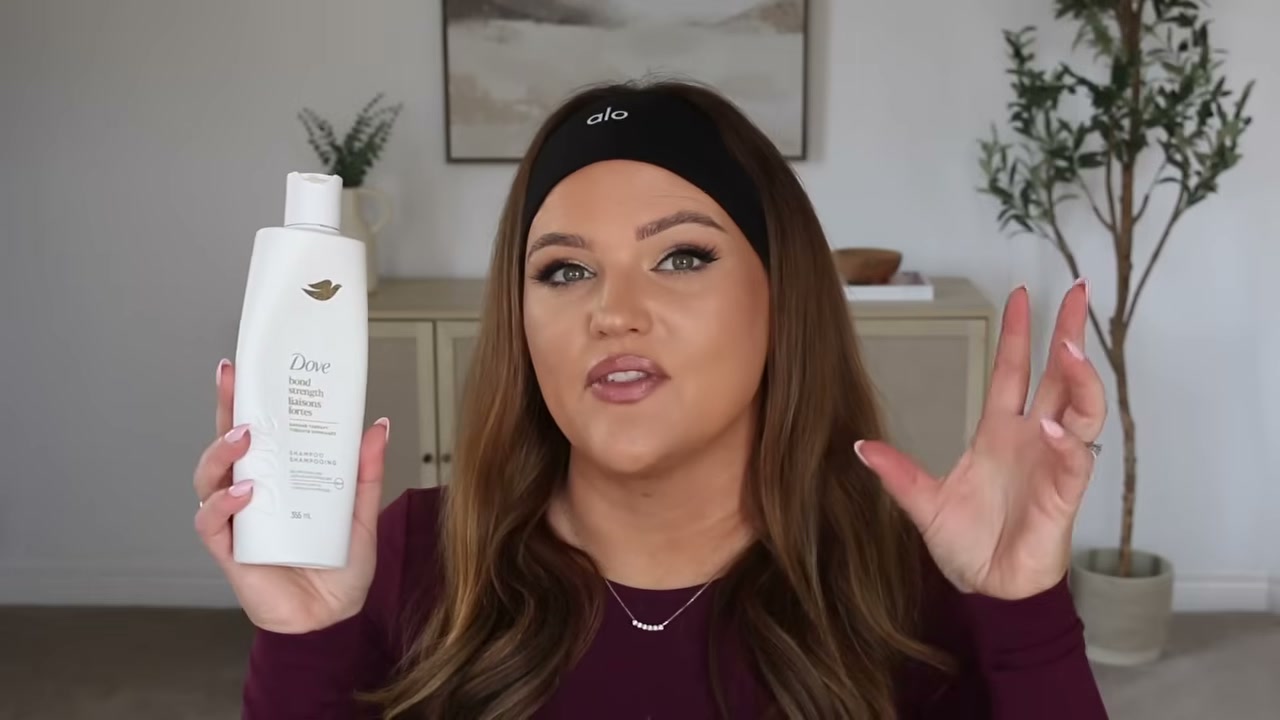 @makeupbycheryl reviewing Dove Dove Bond Strength Shampoo at 22:17 in a YouTube Shorts video