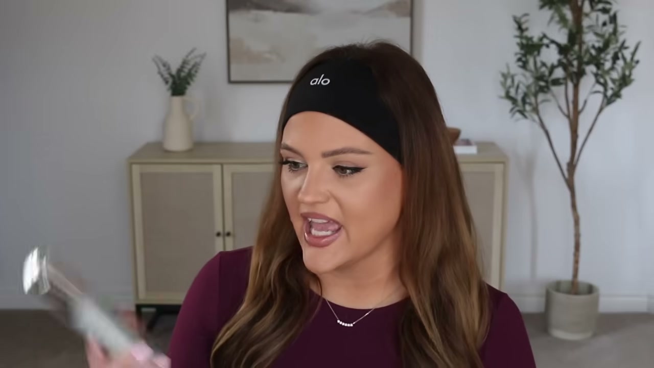 @makeupbycheryl reviewing Kenra Professional Platinum Blow-Dry Mist at 23:38 in a YouTube Shorts video