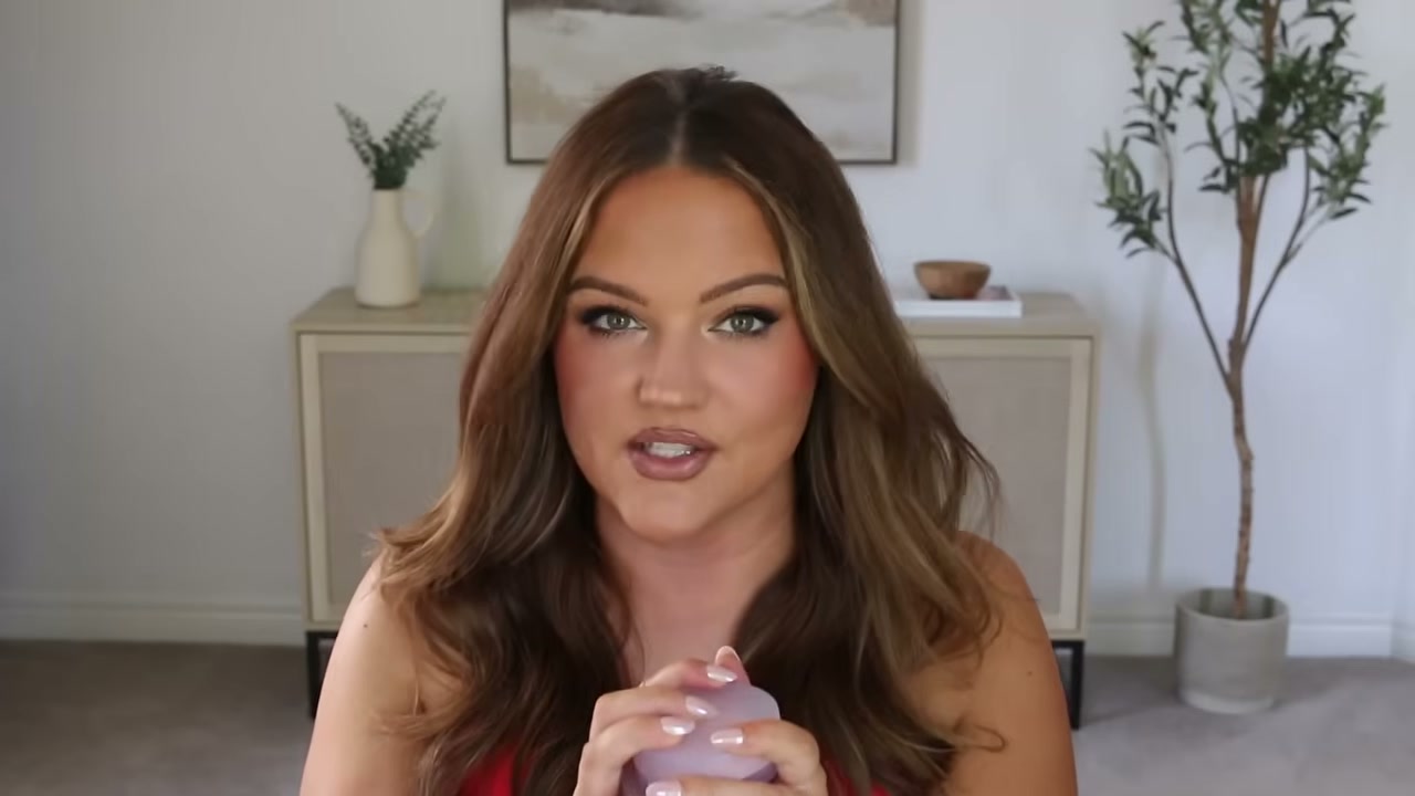 @makeupbycheryl reviewing Kosas Cloud Set Setting Powder at 02:17 in a YouTube Shorts video