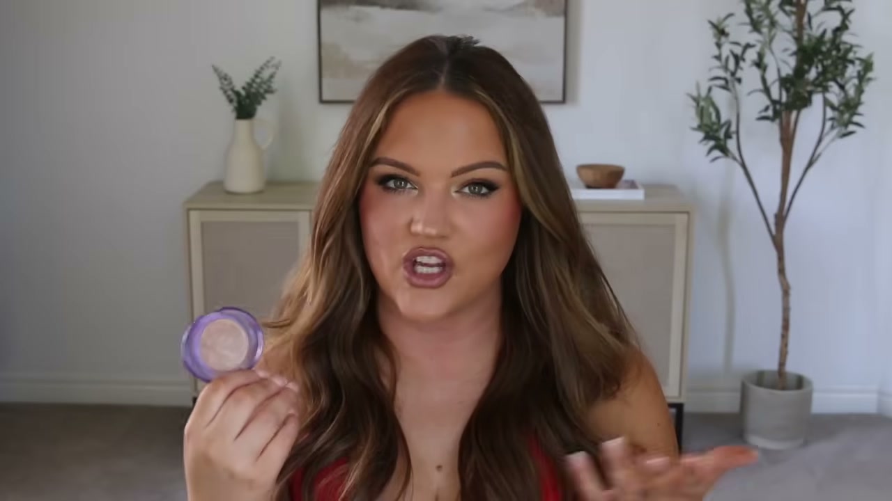@makeupbycheryl reviewing Kosas Powder Highlighter at 11:02 in a YouTube Shorts video