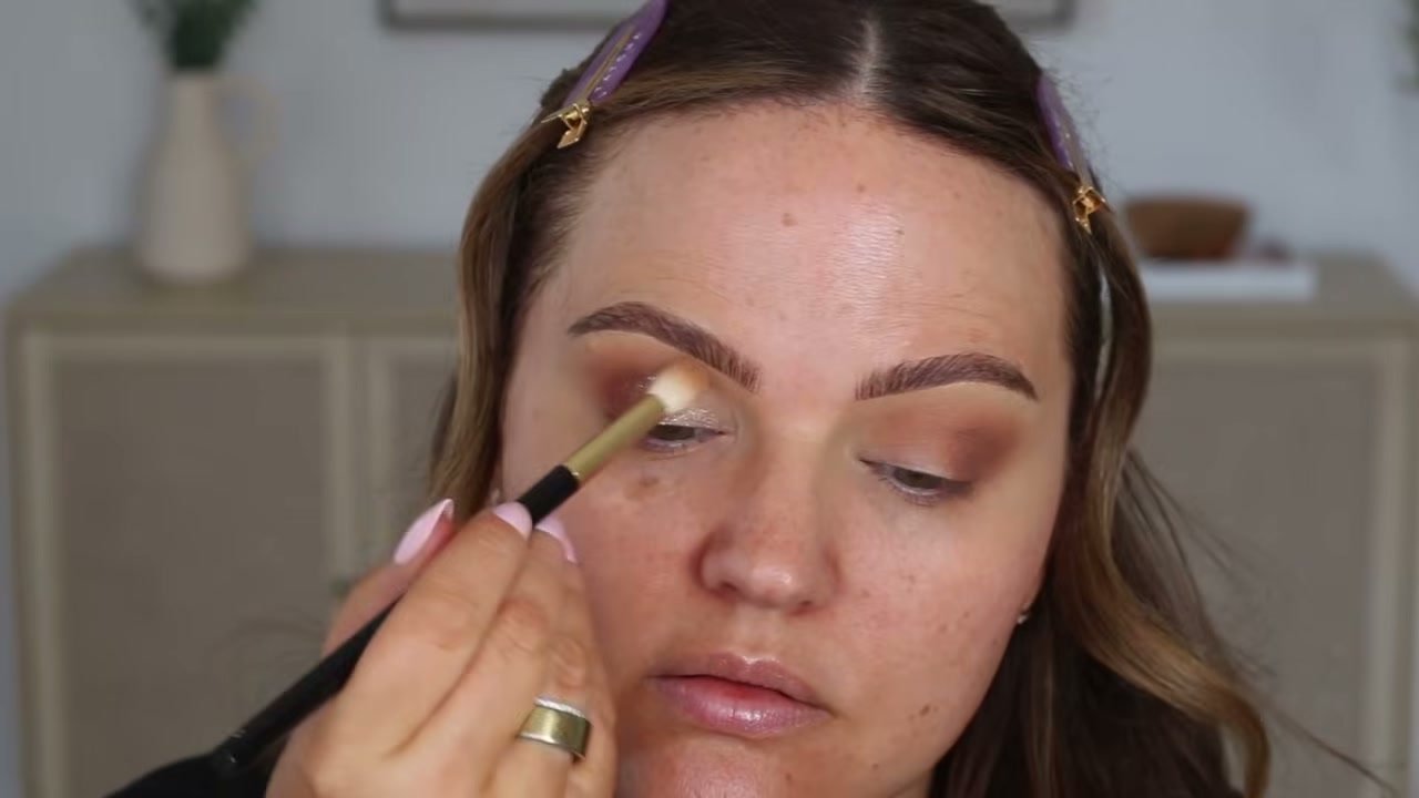 @makeupbycheryl reviewing Tower 28 Beauty GoGo Cooling Shimmer Eyeshadow Stick at 03:23 in a YouTube Shorts video