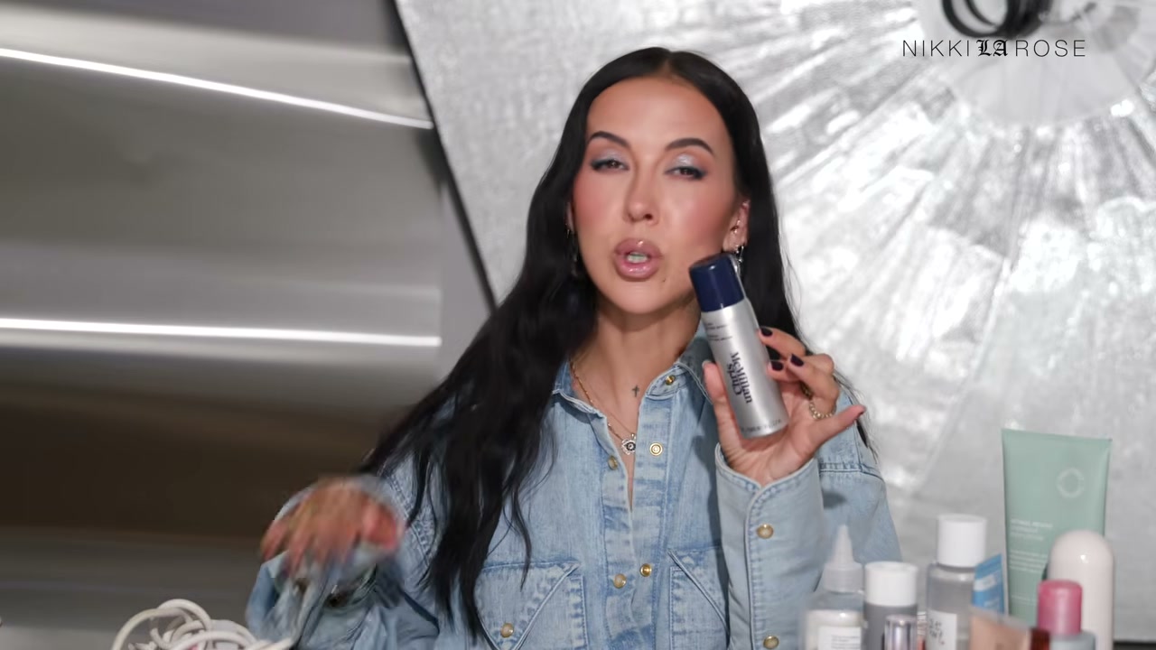 @makeupbynikkilarose reviewing Chris Mcmillan Dry Texture Spray at 24:15 in a YouTube Shorts video