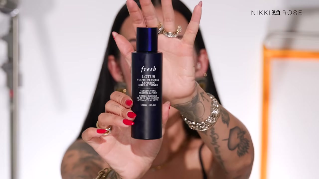 @makeupbynikkilarose reviewing Fresh Lotus Youth Preserve Refining Dream Toner at 28:23 in a YouTube Shorts video
