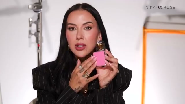 @makeupbynikkilarose reviewing Haus Labs Color Fuse Talc-Free Blush Powder at 14:03 in a YouTube Shorts video