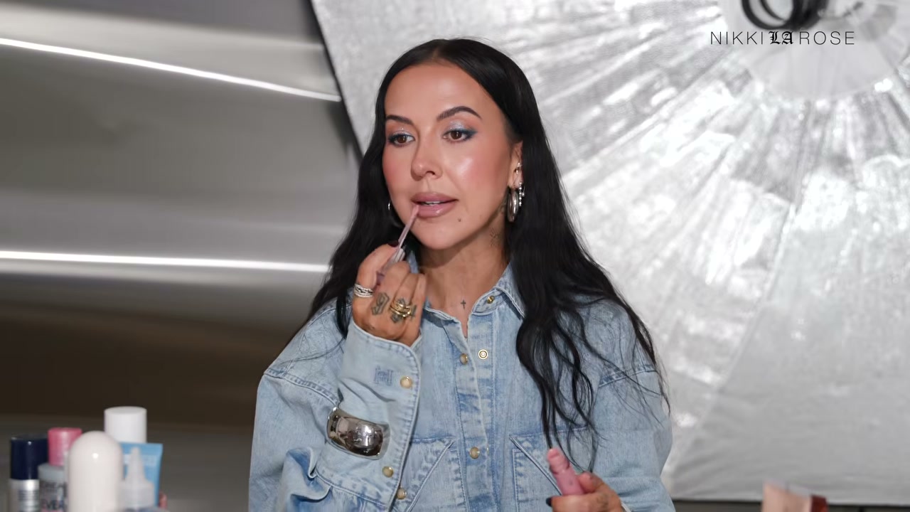 @makeupbynikkilarose reviewing MAC Cosmetics Lipglass Cushion at 12:10 in a YouTube Shorts video