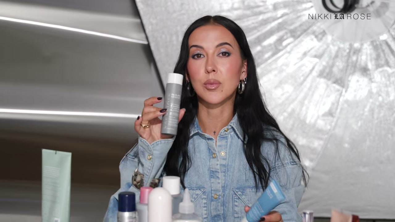 @makeupbynikkilarose reviewing Paula's Choice AHA Liquid Exfoliant at 16:07 in a YouTube Shorts video