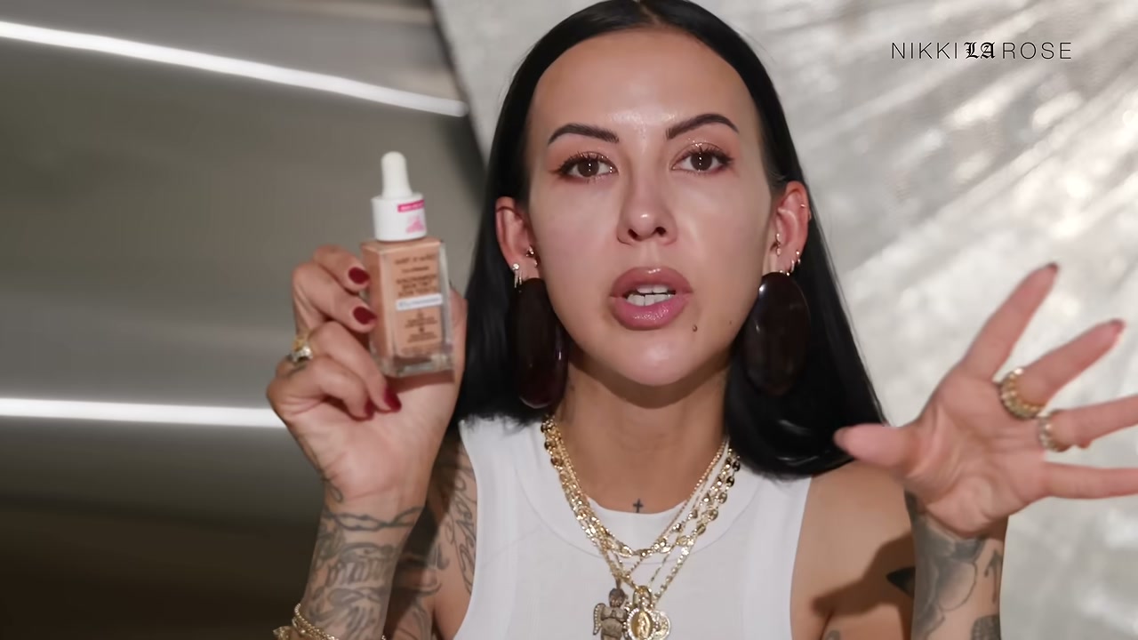 @makeupbynikkilarose reviewing Wet n Wild Niacinamide Skin Tint at 39:09 in a YouTube Shorts video
