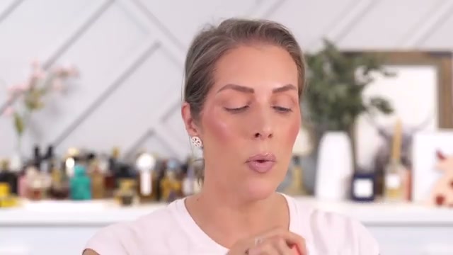 @mandydavismua reviewing RMS Beauty Lip Oil at 12:17 in a YouTube Shorts video