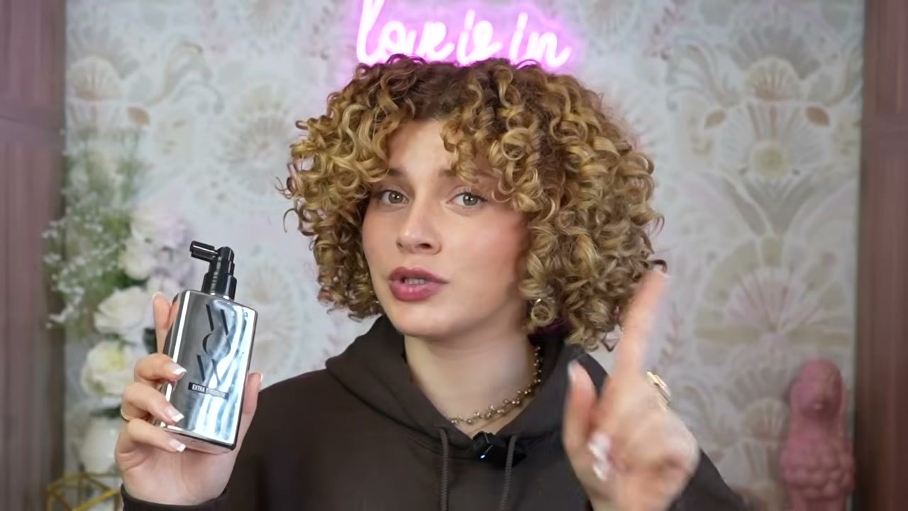 @manesbymell reviewing Color Wow Dream Coat at 10:20 in a YouTube Shorts video