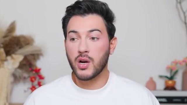 @mannymua733 reviewing Be Pure Hydrating Lip Oil at 11:44 in a YouTube Shorts video