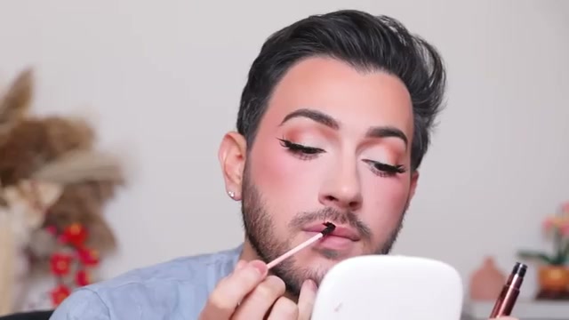 @mannymua733 reviewing Hard Candy Peel-Off Lip Stains at 15:34 in a YouTube Shorts video