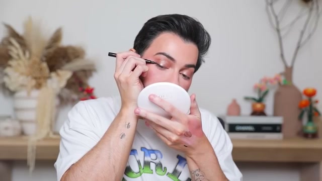 @mannymua733 reviewing Marie Claire Felt Tip Ultra Black Liner at 14:28 in a YouTube Shorts video