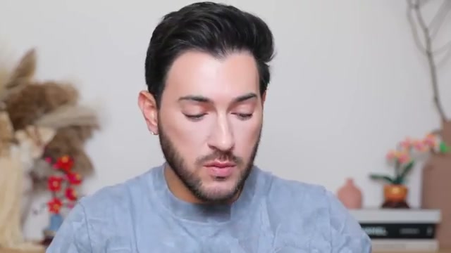 @mannymua733 reviewing Nude by Nature Dewy Serum Blush Drops at 07:33 in a YouTube Shorts video