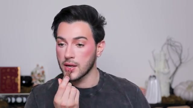 @mannymua733 reviewing W7 Naked Desire Lipstick at 14:08 in a YouTube Shorts video