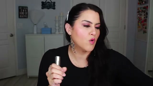 @melirodriguez reviewing Ciaté London Dewy Glosses at 14:25 in a YouTube Shorts video