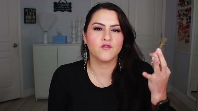 @melirodriguez reviewing Clinique Happy Heart at 22:32 in a YouTube Shorts video