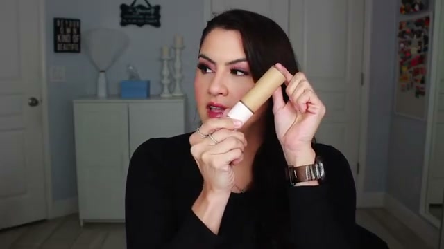 @melirodriguez reviewing Rare Beauty Foundation at 18:53 in a YouTube Shorts video