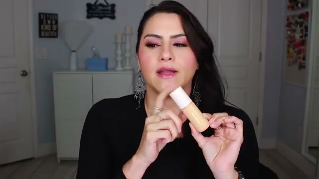 @melirodriguez reviewing Rare Beauty Positive Light Tinted Moisturizer at 03:25 in a YouTube Shorts video