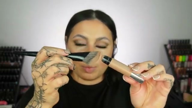 @missmeganrobinsonn reviewing BK Beauty N19 Brush at 24:09 in a YouTube Shorts video