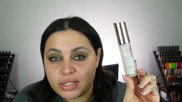 @missmeganrobinsonn reviewing MAC Cosmetics Lightstruck Liquid Highlighter at 01:22 in a YouTube Shorts video