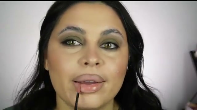 @missmeganrobinsonn reviewing MOB Beauty Riff Lip Gloss at 16:04 in a YouTube Shorts video