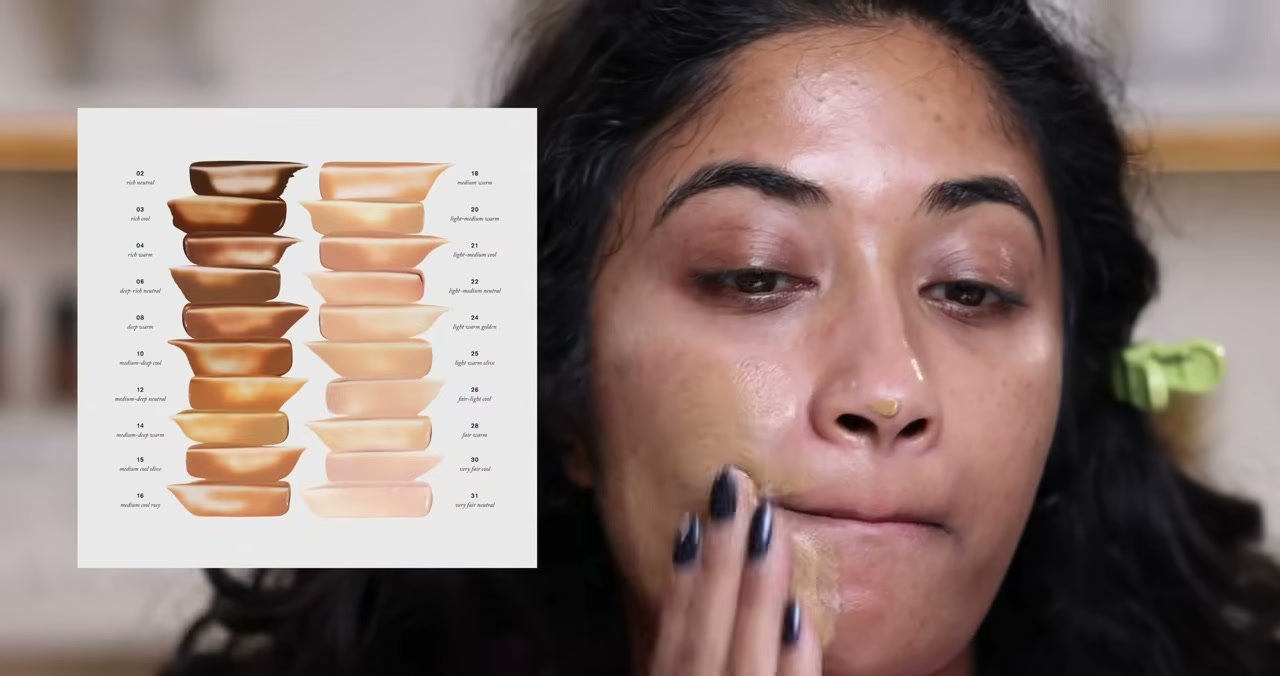 @monica.raviii reviewing Merit The Uniform Tinted Mineral Sunscreen Broad Spectrum SPF 45 at 14:23 in a YouTube Shorts video