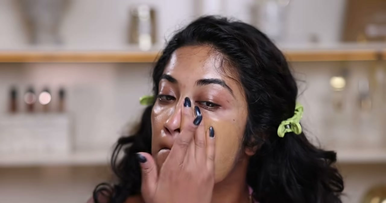 @monica.raviii reviewing Tower 28 Beauty Sunnydays Skin Tint with Mineral Zinc SPF 30 at 07:34 in a YouTube Shorts video