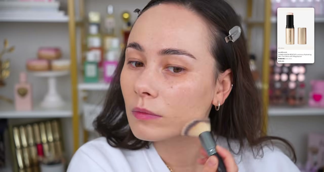 @morganturnermakeup reviewing bareMinerals Complexion Rescue Luminous Skin Tint Stick at 02:47 in a YouTube Shorts video