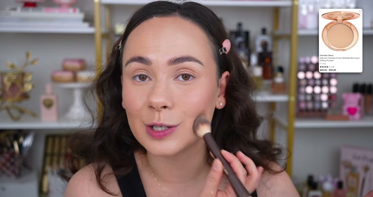 @morganturnermakeup reviewing Charlotte Tilbury Airbrush Flawless Finish Powder at 14:34 in a YouTube Shorts video