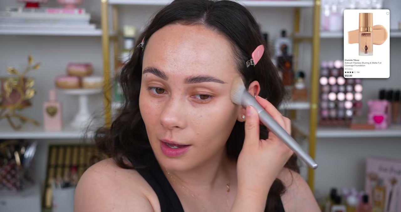 @morganturnermakeup reviewing Charlotte Tilbury Airbrush Flawless Foundation at 07:03 in a YouTube Shorts video