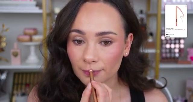 @morganturnermakeup reviewing Charlotte Tilbury Lip Cheat at 22:09 in a YouTube Shorts video