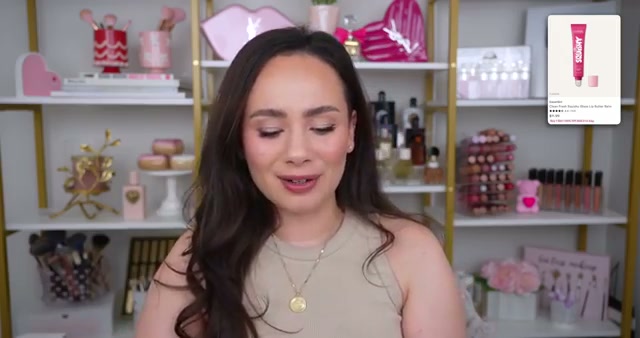 @morganturnermakeup reviewing CoverGirl Squishy Glaze Lip Butter Balm at 34:28 in a YouTube Shorts video