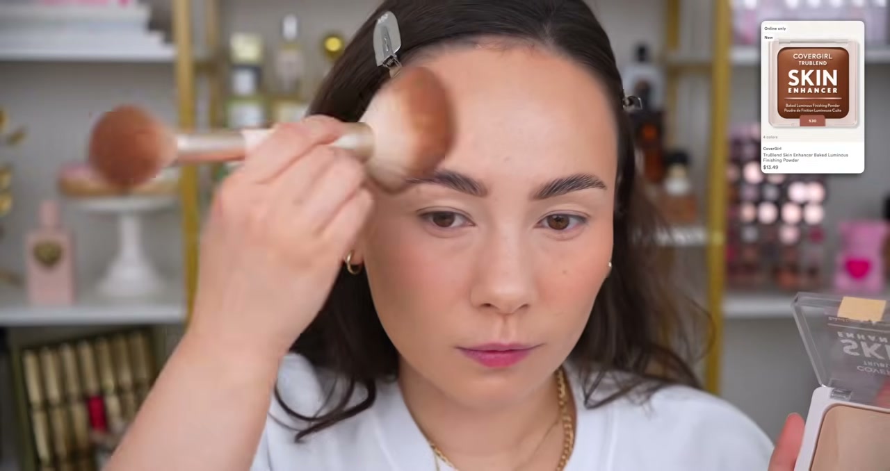 @morganturnermakeup reviewing CoverGirl Trublend Skin Enhancer Baked Luminous Finishing Powder at 08:38 in a YouTube Shorts video