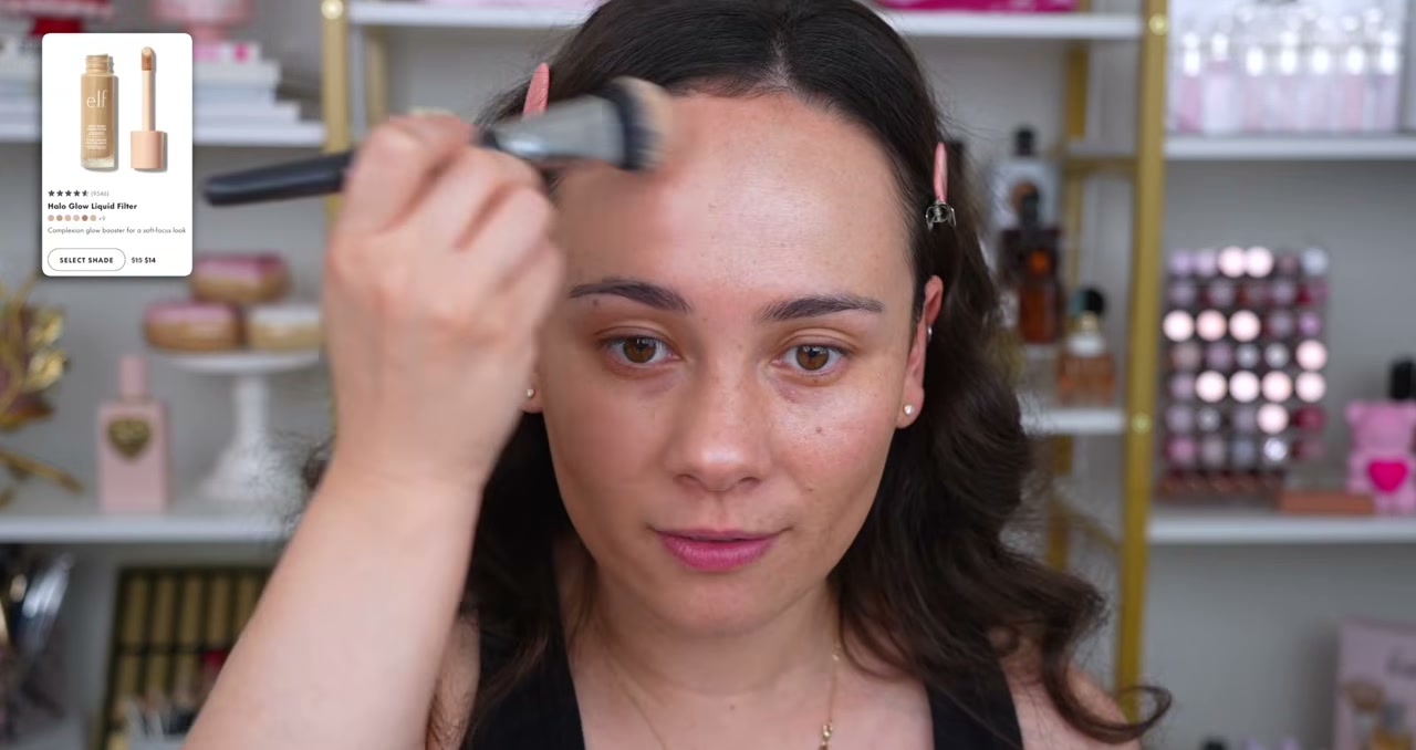@morganturnermakeup reviewing e.l.f. Cosmetics Halo Glow Liquid Filter at 06:00 in a YouTube Shorts video
