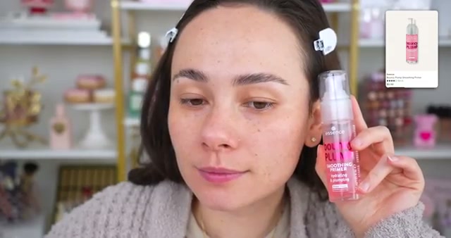 @morganturnermakeup reviewing Essence Bouncy Plump Smoothing Primer at 04:01 in a YouTube Shorts video