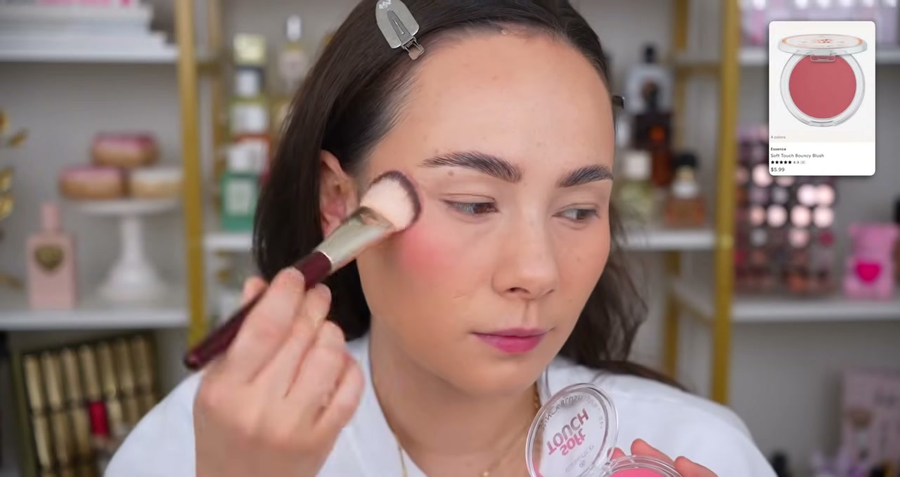 @morganturnermakeup reviewing Essence Soft Touch Bouncy Blush at 14:22 in a YouTube Shorts video