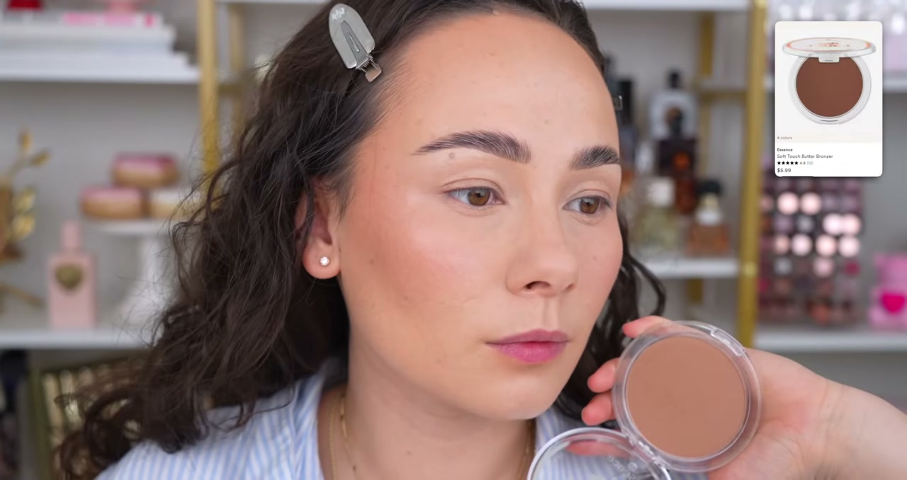 @morganturnermakeup reviewing Essence Soft Touch Butter Bronzer at 09:27 in a YouTube Shorts video