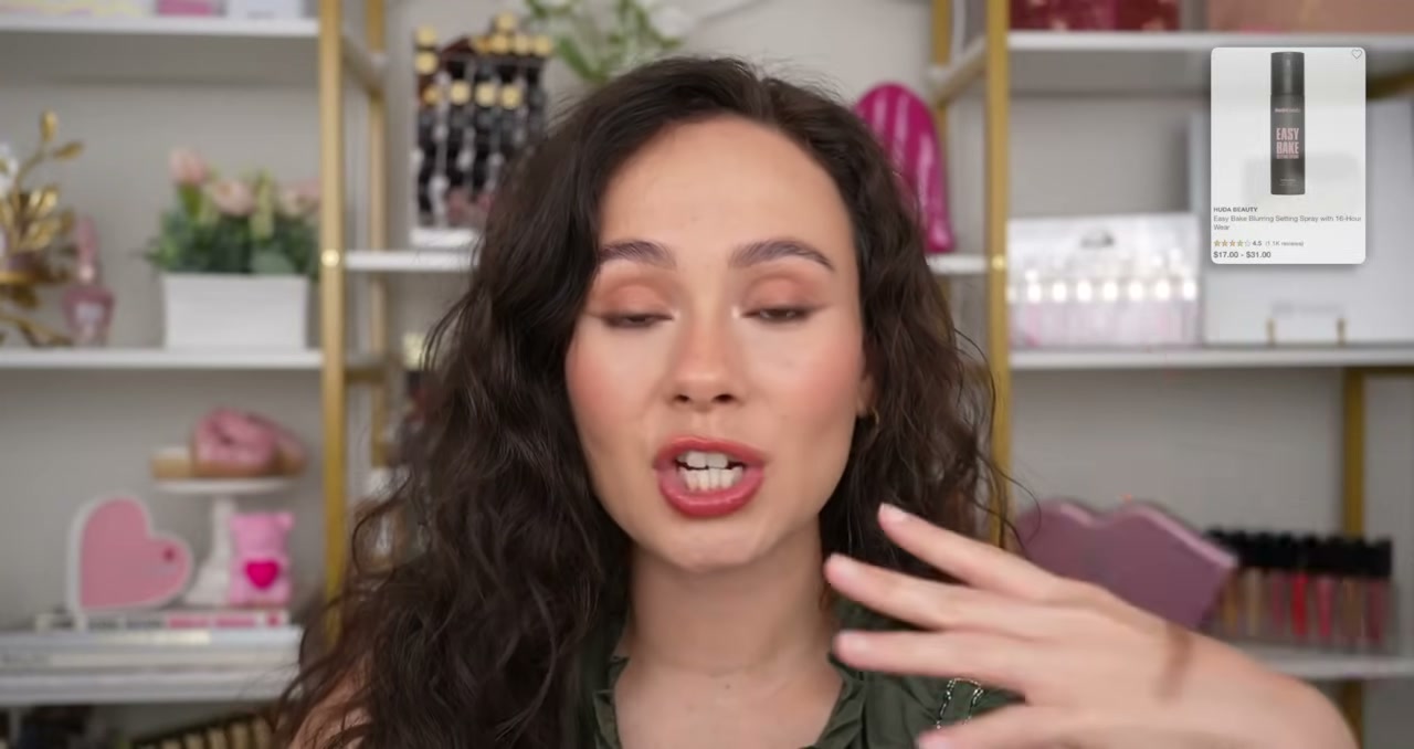 @morganturnermakeup reviewing Huda Beauty Easy Bake Blurring Setting Spray at 22:37 in a YouTube Shorts video