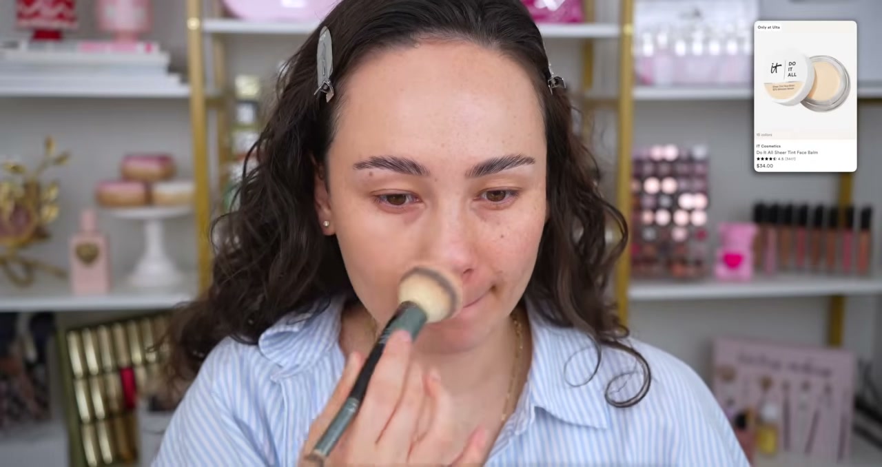@morganturnermakeup reviewing IT Cosmetics Do It All Sheer Tint Face Balm at 04:52 in a YouTube Shorts video