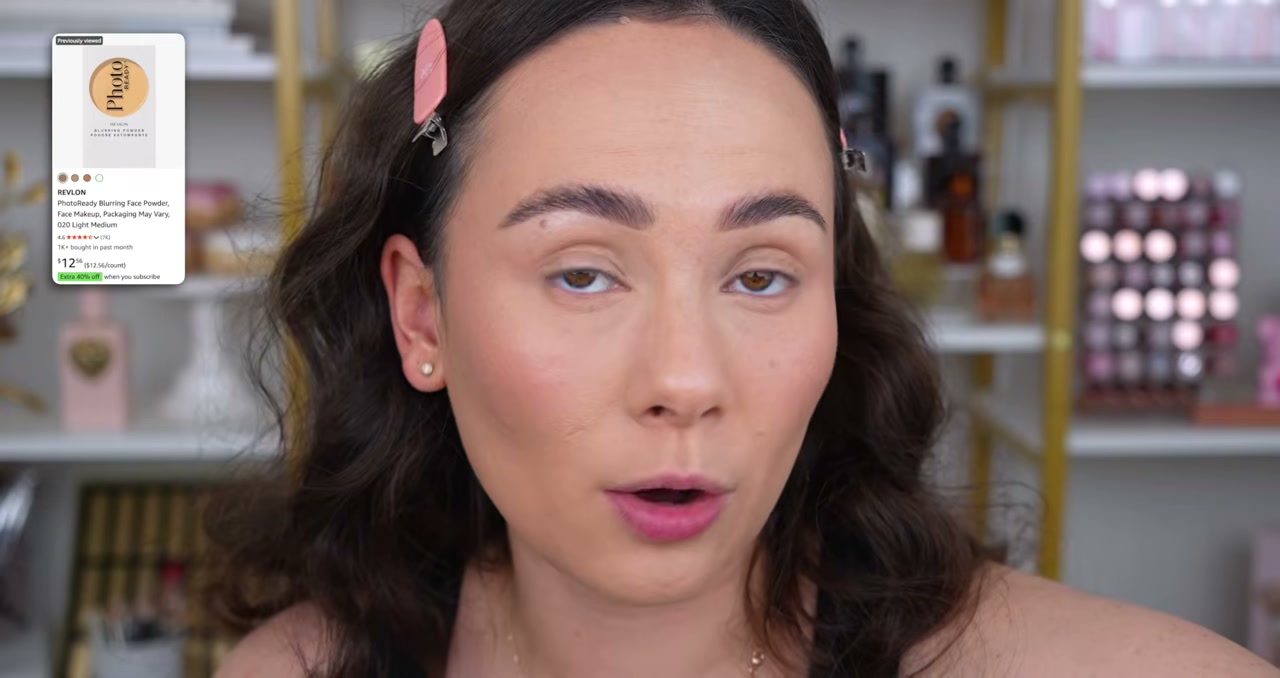 @morganturnermakeup reviewing Revlon Photoready Blurring Powder at 15:21 in a YouTube Shorts video