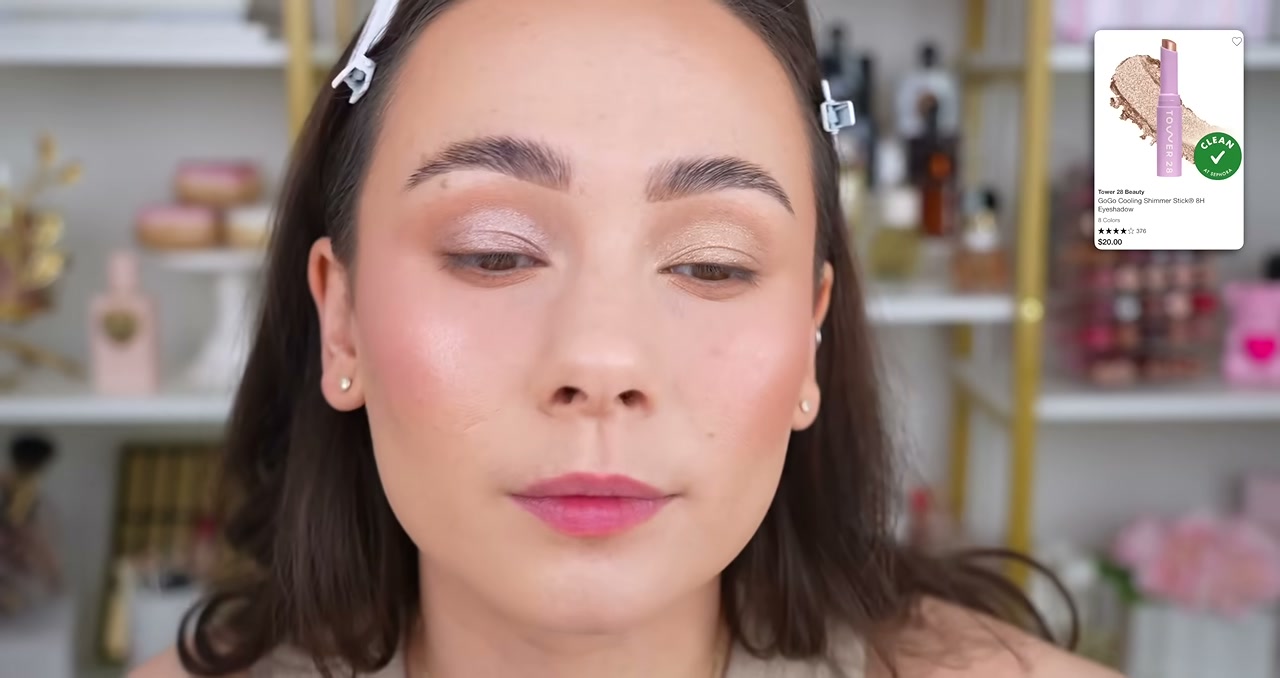 @morganturnermakeup reviewing Tower 28 Beauty Gogo Cooling Shimmer Stick at 29:34 in a YouTube Shorts video